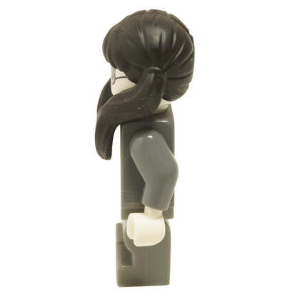 Side view of Moaning Myrtle minifigure wearing dark bluish gray robe with long dark hair tied back