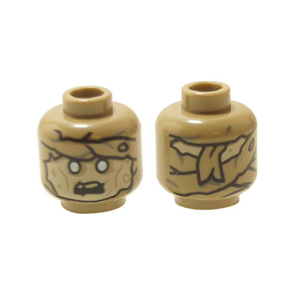 Dark tan mummy minifigure head with bandage wrappings and glowing white eyes print
