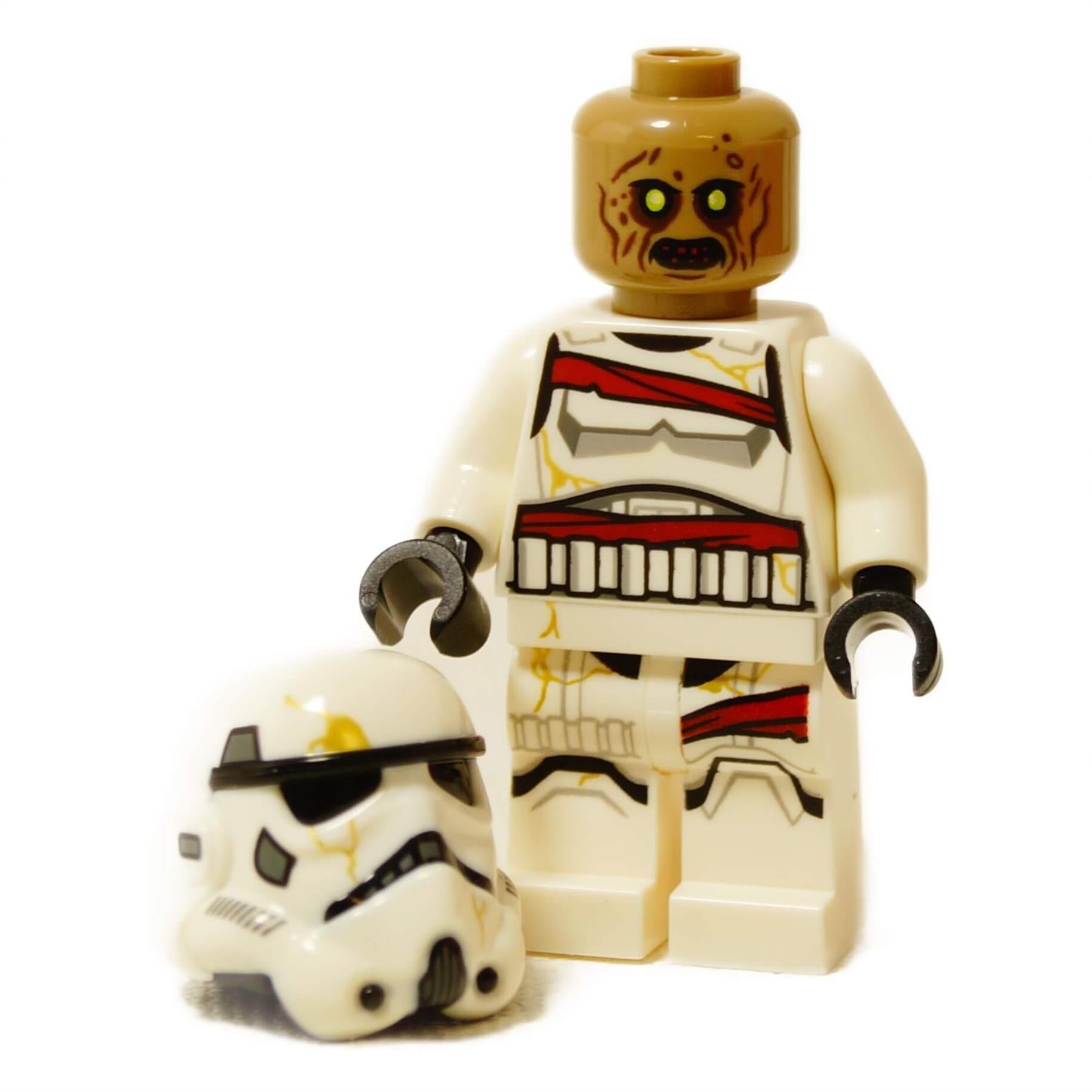Minifigura de Night Trooper de la serie Ahsoka con el casco quitado, mostrando un rostro dañado y armadura blanca
