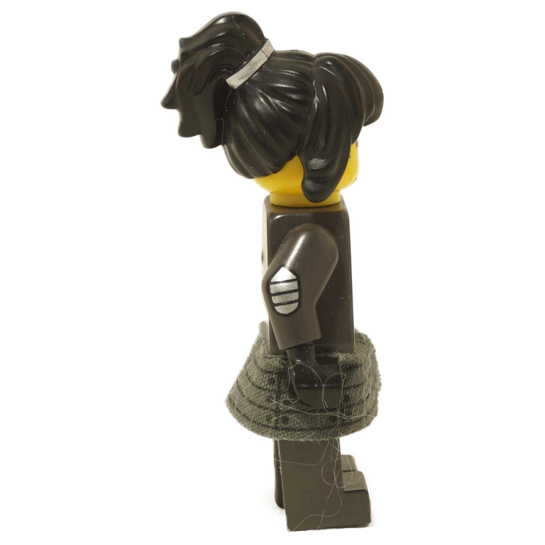 side profile view of LEGO Ninjago Nya minifigure from The LEGO Ninjago Movie with dark hair and detailed ninja outfit njo321
