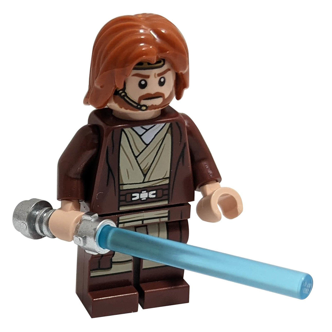 LEGO Star Wars minifigure of Obi-Wan Kenobi, featuring reddish-brown hair, a headset, brown Jedi robes, and a blue lightsaber.