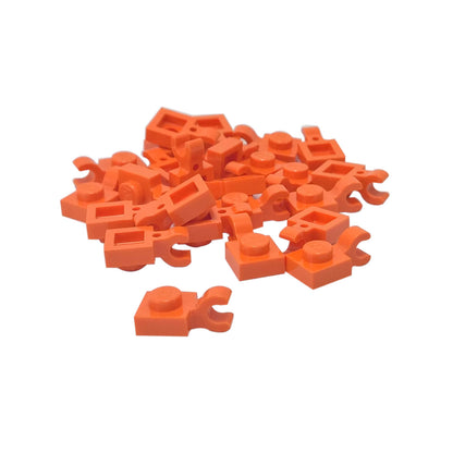 Orange LEGO® modified plate 1 x 1 part 61252 shown from two angles with single stud and open horizontal O clip