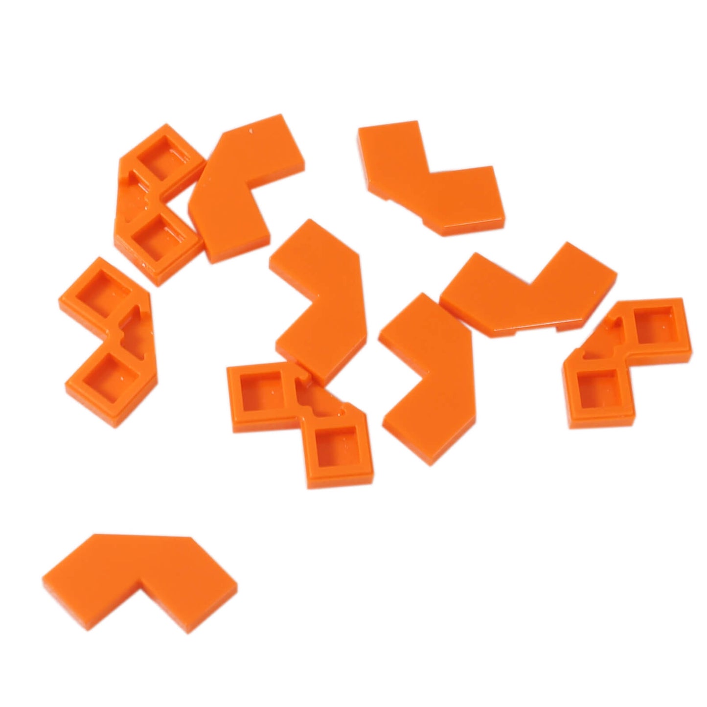 Orange modified facet Tile 2 x 2 for angled detailing, decorative surfaces, and clean LEGO® builds
