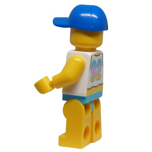 Side view of LEGO® Paradisa Beach Bro minifigure idea235 with bright blue cap