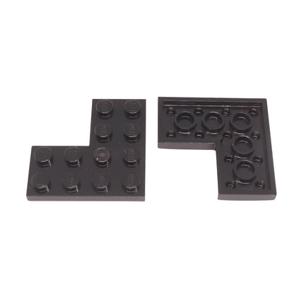 Black LEGO® plate 4x4 corner piece part 2639 with right angle cut-out close-up view