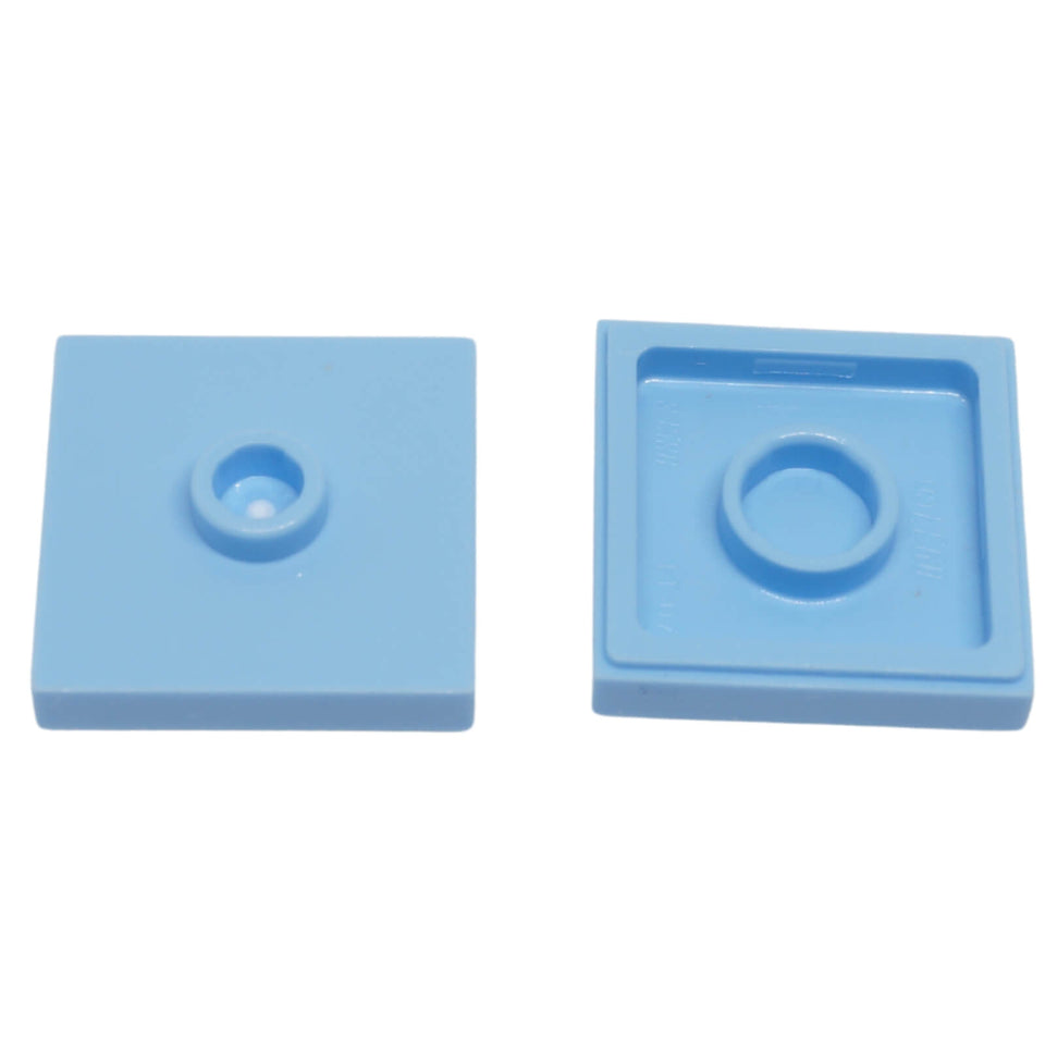 LEGO Plate Modified 2 x 2 with Groove and 1 Stud in Center part 87580 shown from top and underside bright light blue