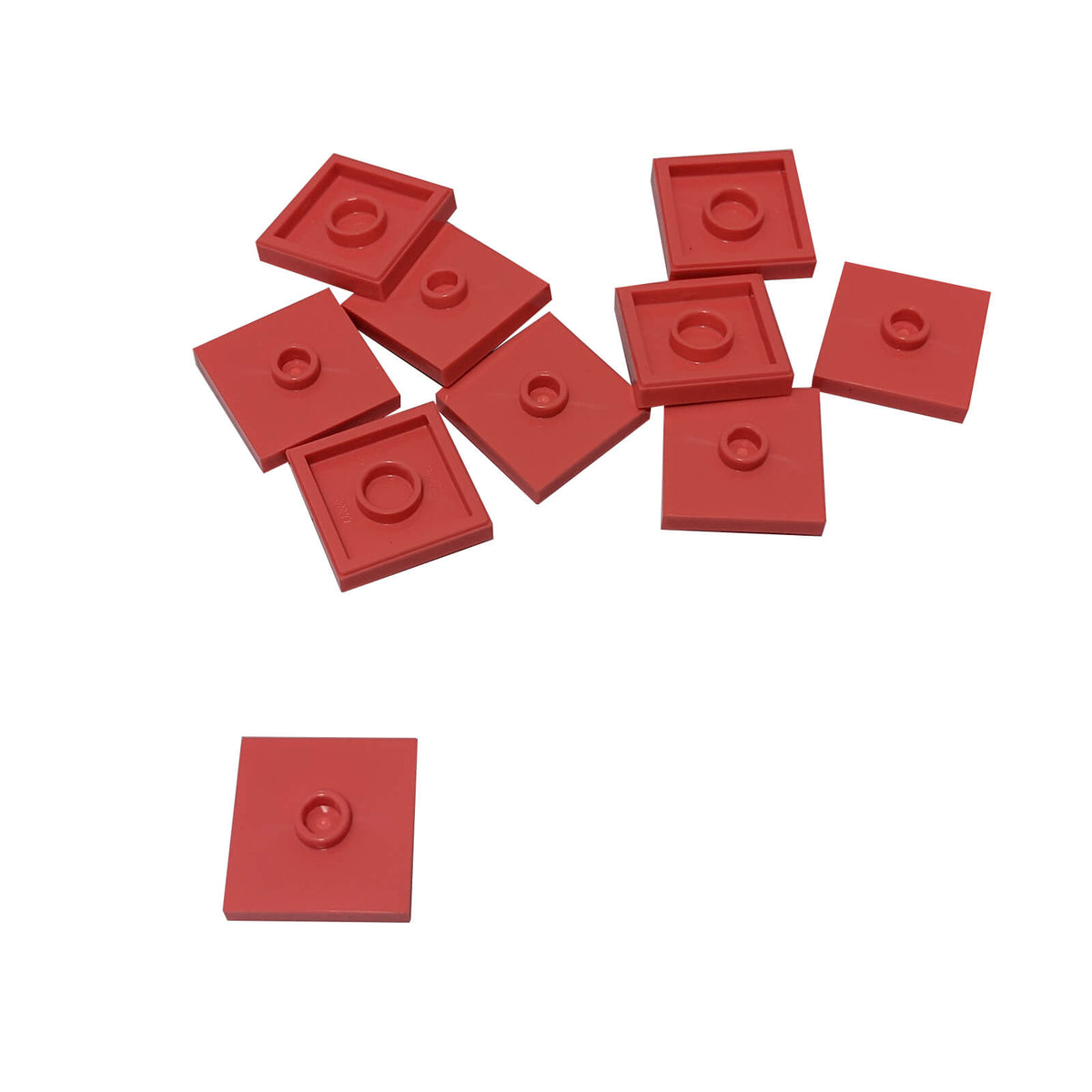 LEGO Plate Modified 2 x 2 with Groove and 1 Stud in Center part 87580 shown from top and underside  coral