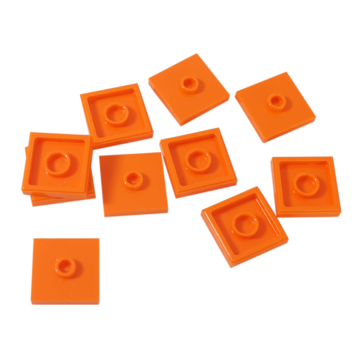 LEGO Plate Modified 2 x 2 with Groove and 1 Stud in Center part 87580 shown from top and underside orange
