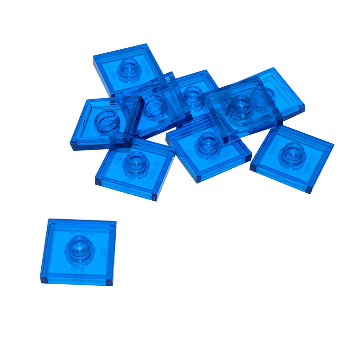 LEGO Plate Modified 2 x 2 with Groove and 1 Stud in Center part 87580 shown from top and underside tranparent dark blue