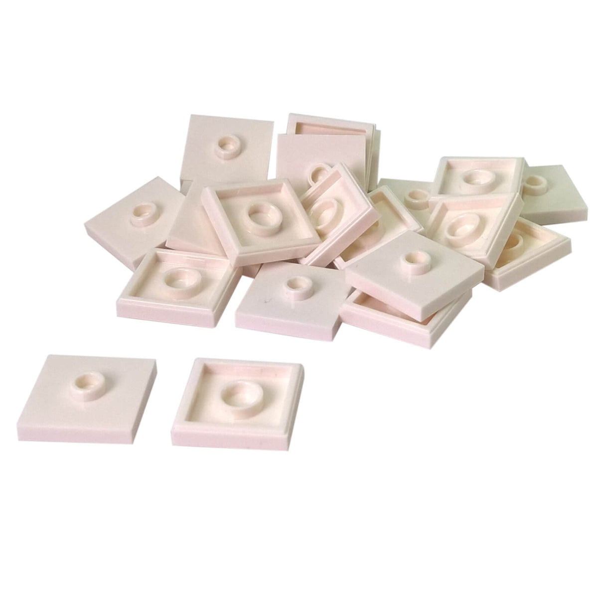 LEGO Plate Modified 2 x 2 with Groove and 1 Stud in Center part 87580 shown from top and underside white