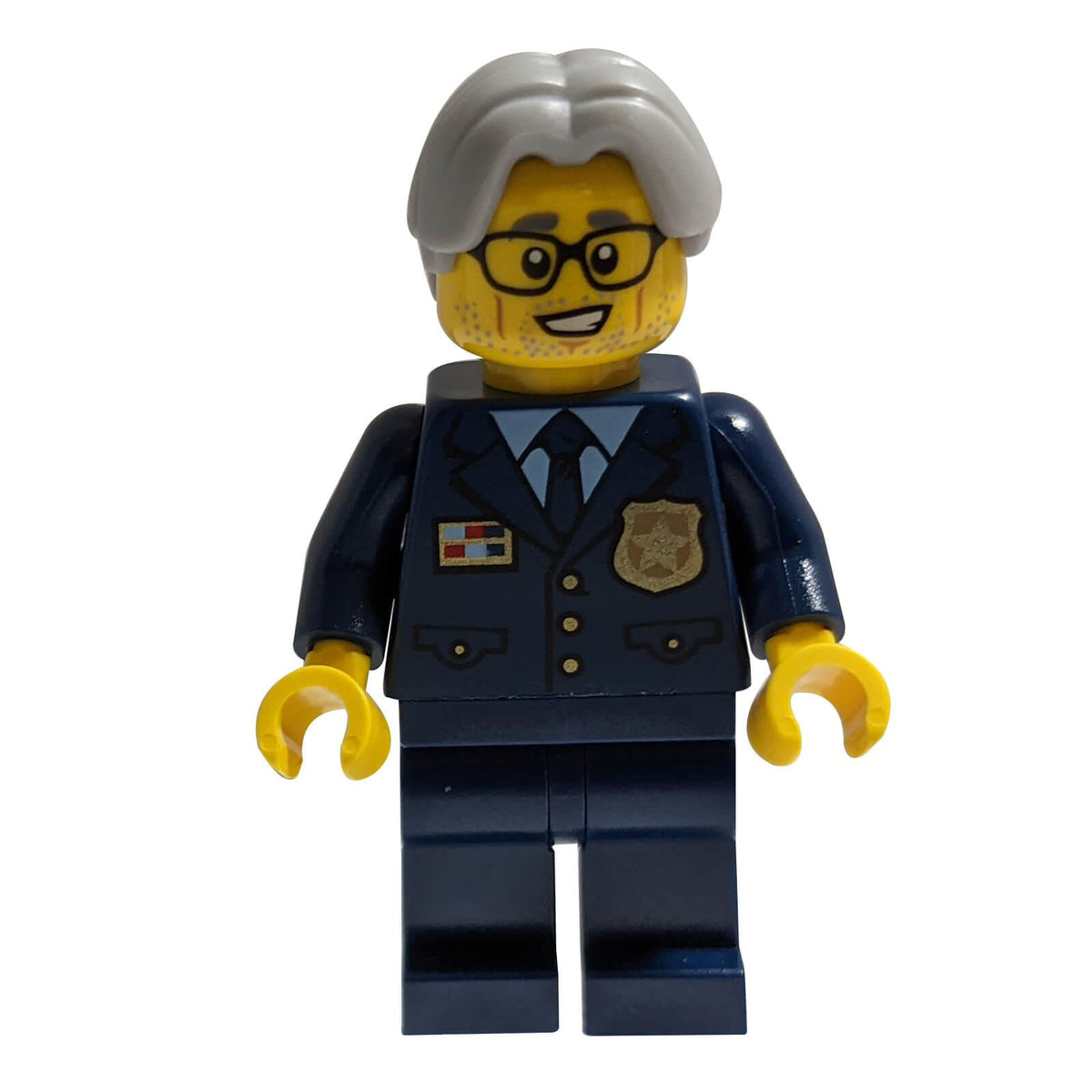 LEGO Police Chief Wheeler cty1124 minifigure with grey hair and glasses.