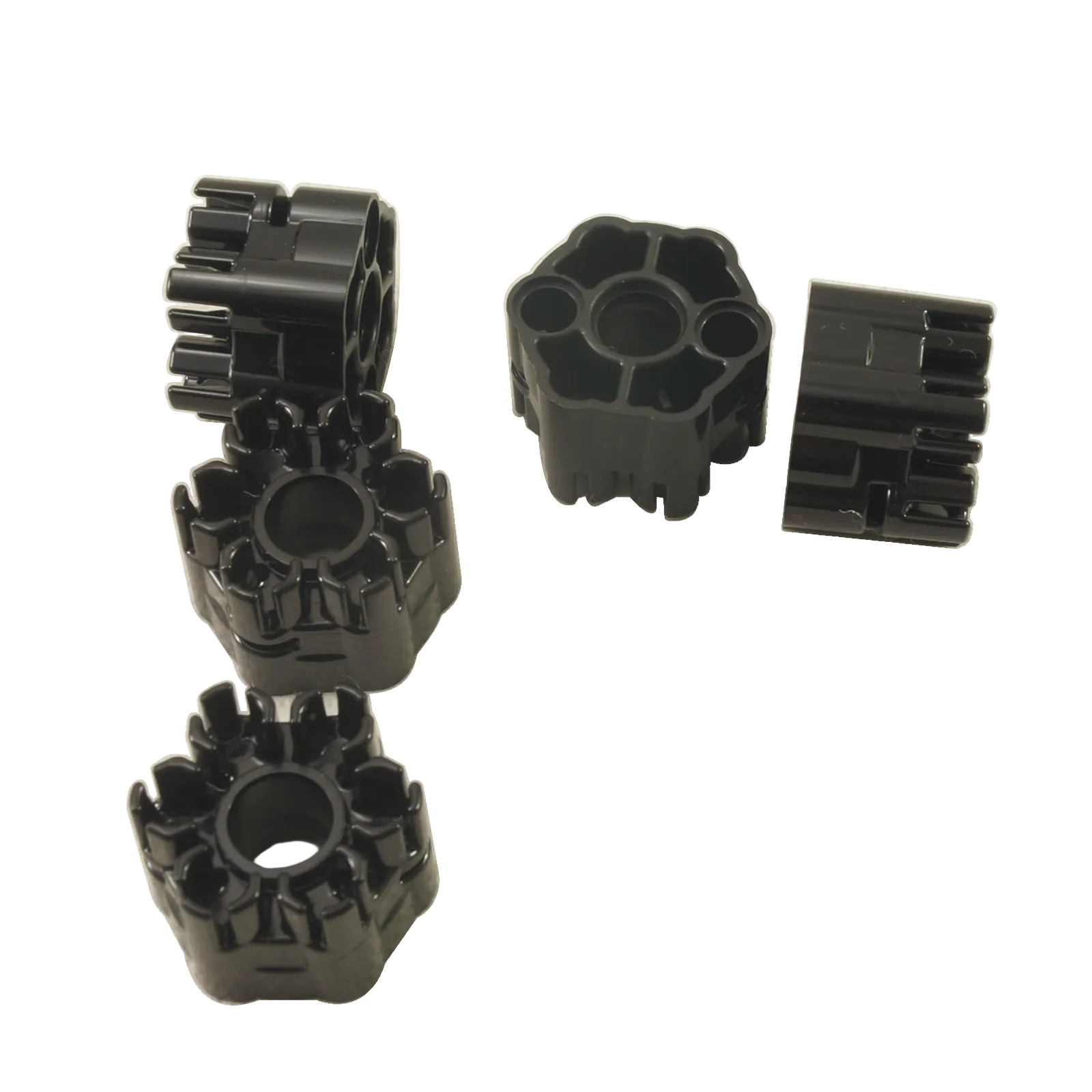 Black rapid shooter projectile launcher part with six angled barrels and rear connection point