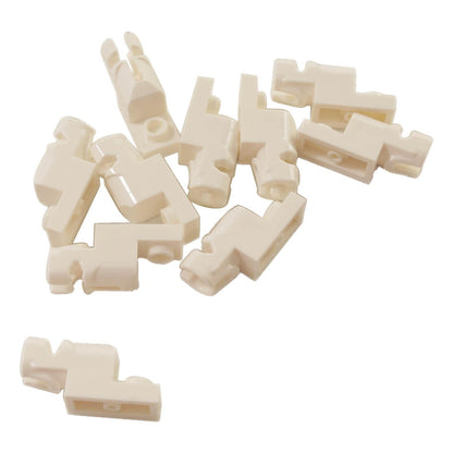 A pile of white LEGO Projectile Launcher 15403 pieces.