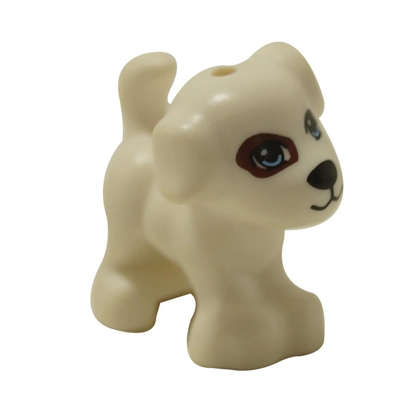 Puppy figure with blue eyes and brown spot markings, shown from front angle
