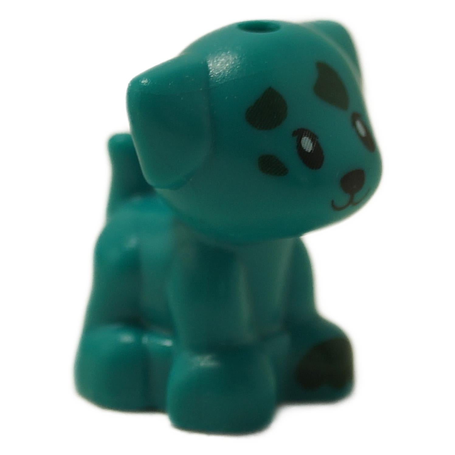 Puppy figure in dark turquoise with green paws and spot markings, shown from front angle
