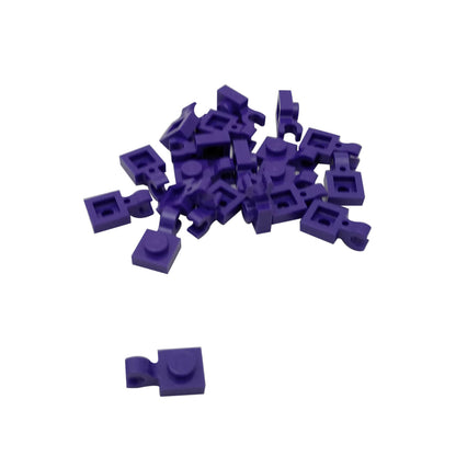 Dark purple LEGO® modified plate 1 x 1 part 61252 shown from two angles with single stud and open horizontal O clip