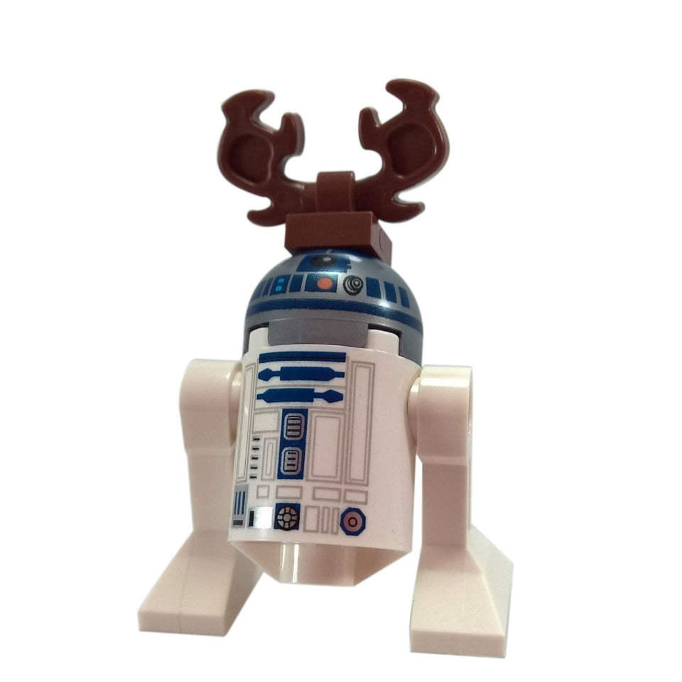 LEGO Star Wars R2-D2 minifigure with brown reindeer antlers on its head. The astromech droid is ready for the holidays.