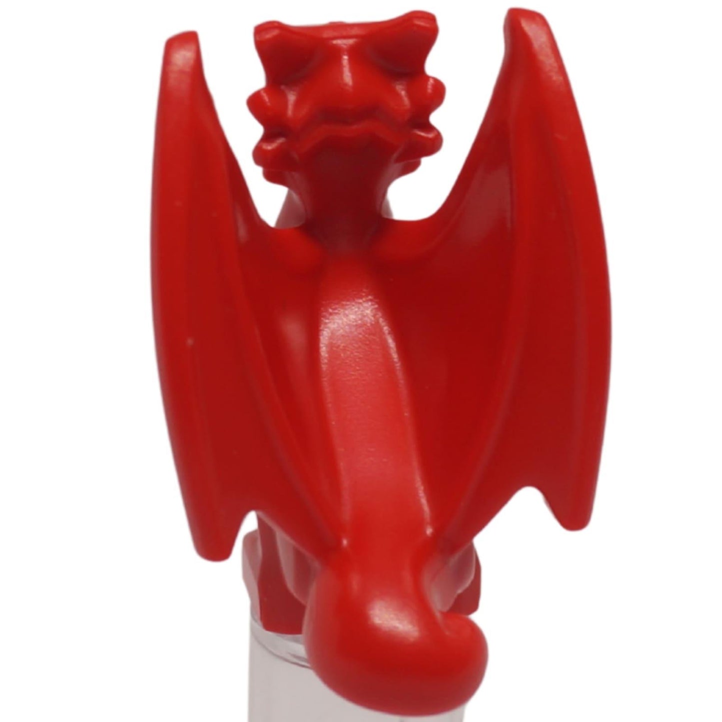 Red baby dragon with folded wings, rear back view small fantasy creature figure
