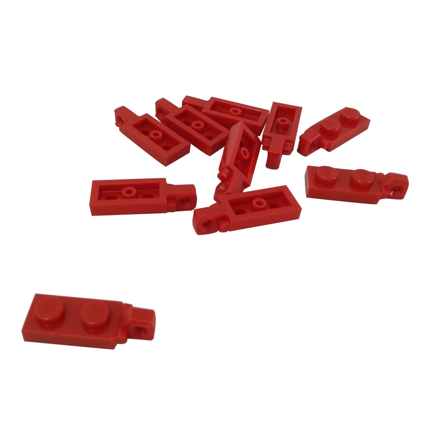 Red hinge plate 1x2 locking with 1 finger on end, without bottom groove, for compact hinged connections.
