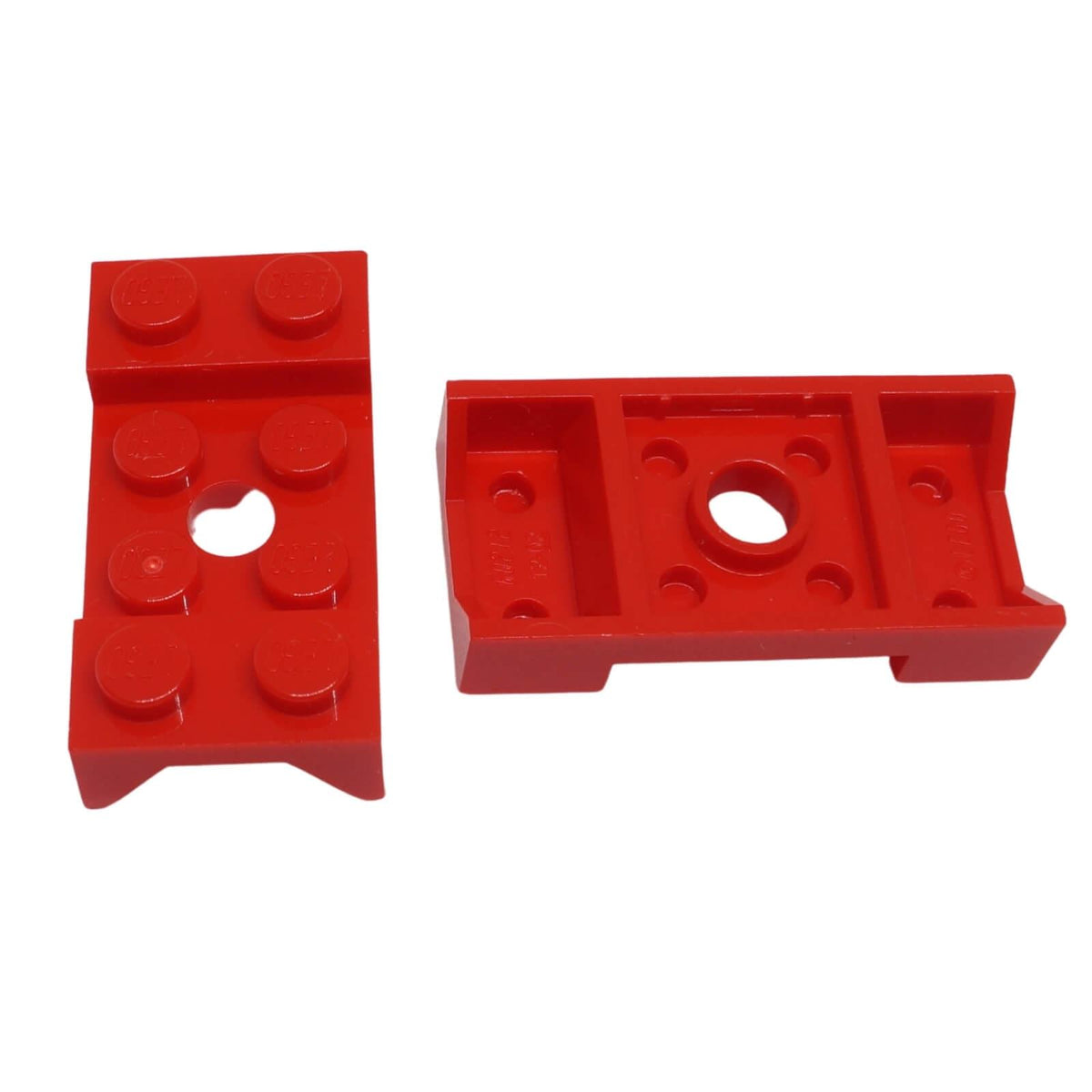 Red LEGO® vehicle mudguard part 60212 shown top and underside with studded 2 x 4 profile, central hole and wheel arch