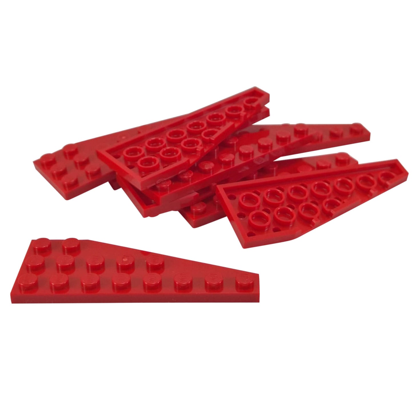 Group of red LEGO Wedge Plate 8x3 Left pieces (50305) piled together.