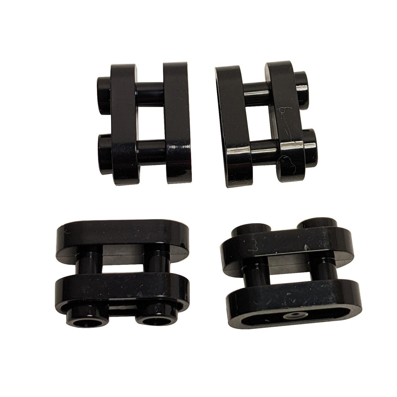LEGO® Round Brick 1 x 2 with Hollow Studs and Open Center with Bars 77808 in black shown from multiple angles