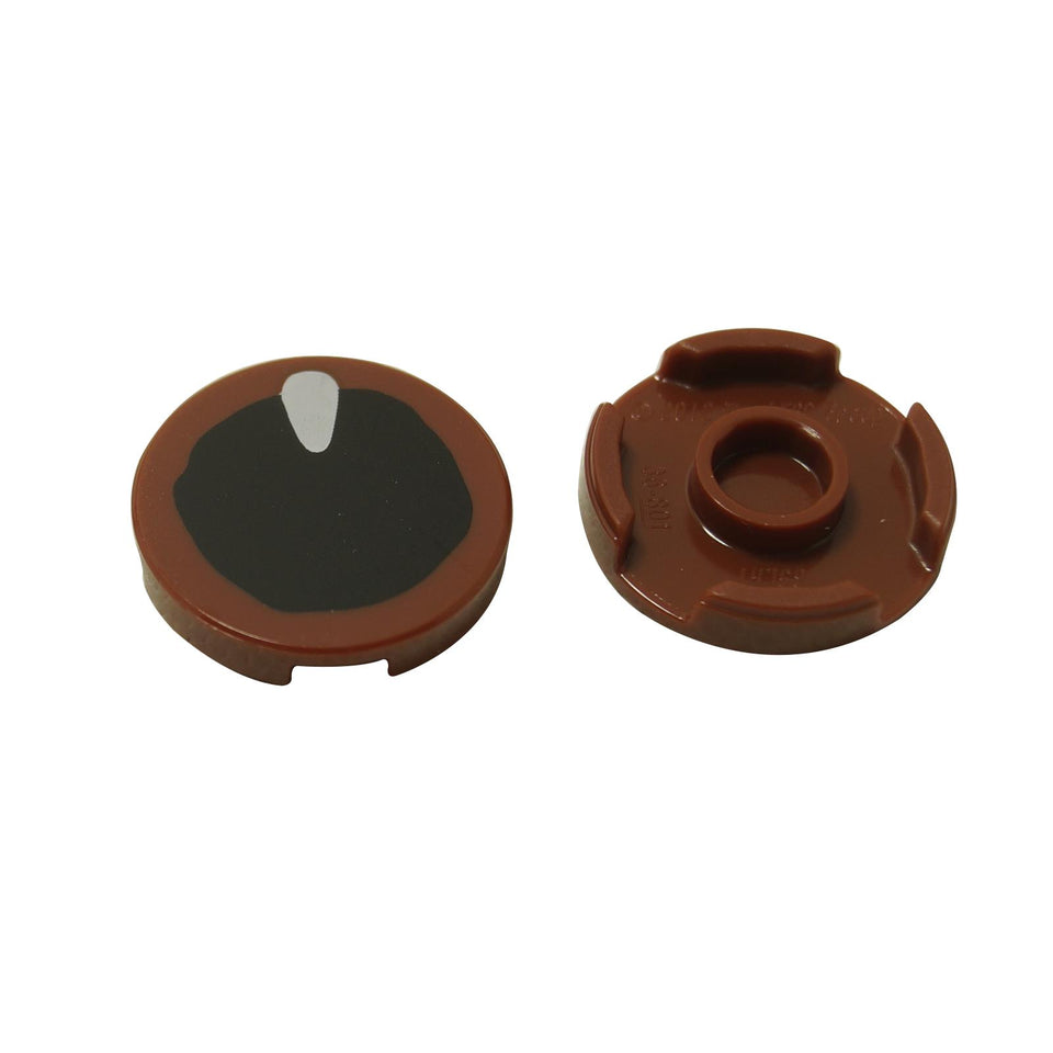 Piastrella rotonda 2x2 con design dell'occhio che presenta una pupilla nera e un riflesso bianco, mostrata davanti e dietro

