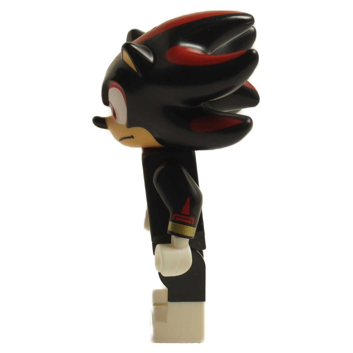 Side view of LEGO Shadow the Hedgehog minifigure son012 showing black and red quills and red-striped shoes