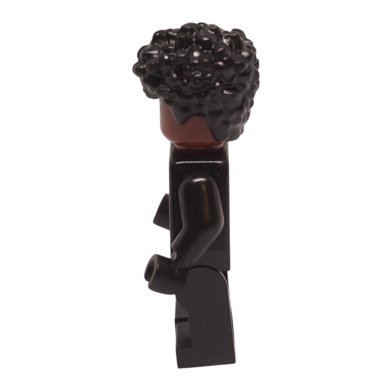 Shuri minifigure side view with curly black hair and black suit
