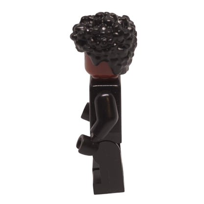 Shuri minifigure side view with curly black hair and black suit
