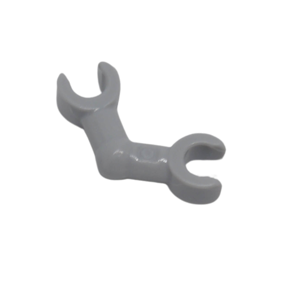 LEGO® Skeleton Arm with Horizontal Clips 93609 in light bluish grey with a bent arm design and clip connections at both ends.