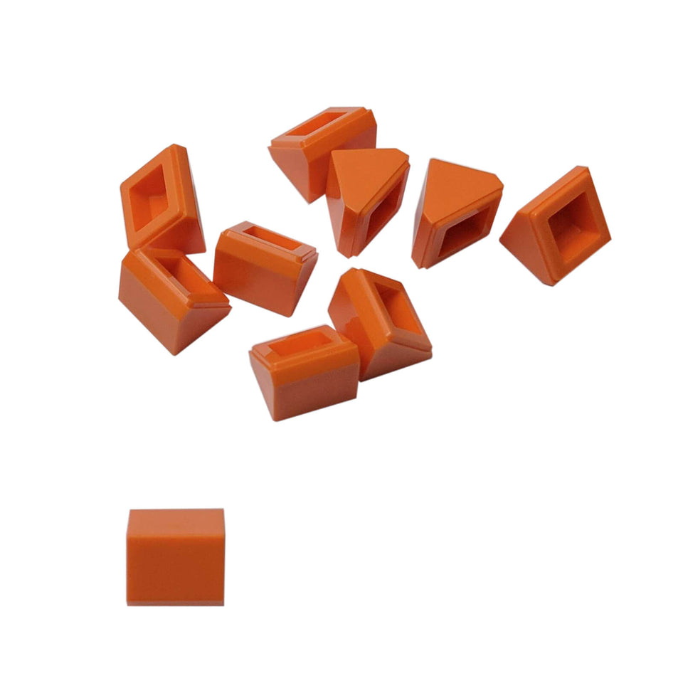 Orange double slope piece measuring 1 x 1 x 2/3 with 45-degree angle, smooth surfaces on two sides
