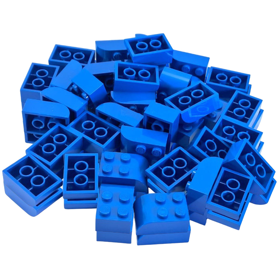 Blue LEGO® curved slope 3x2 with four studs part 6215 smooth rounded top close-up view
