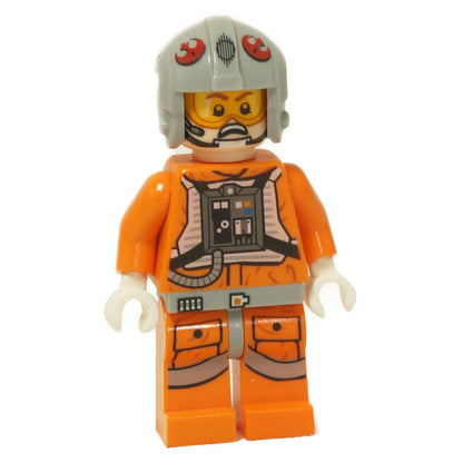 LEGO® Snowspeeder Pilot Minifigure wearing an orange flight suit with detailed chest controls and a light bluish-gray helmet featuring red Rebel insignias.