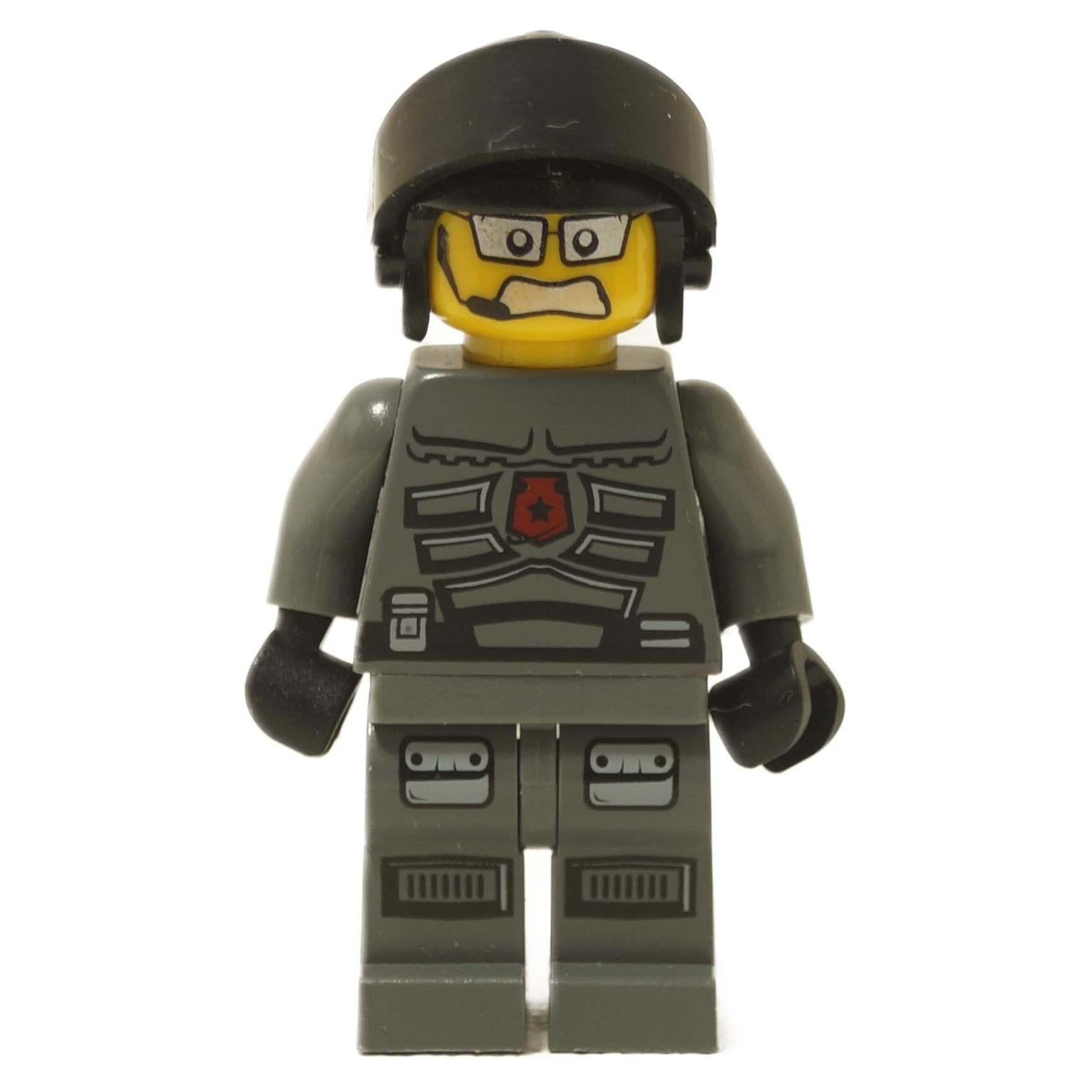 Space Police 3 Officer 1 minifigure 5969 with dark gray uniform, printed armor details, black helmet, and stern facial expression