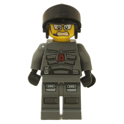 Space Police 3 Officer 1 minifigure 5969 with dark gray uniform, printed armor details, black helmet, and stern facial expression