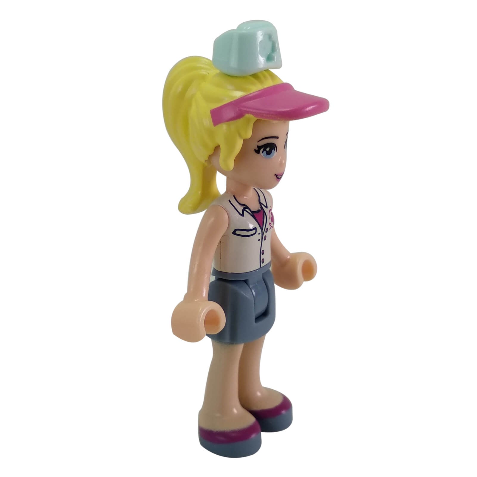 LEGO Stephanie minifigure frnd0076 with lavender blouse sand green skirt and hat, side  view