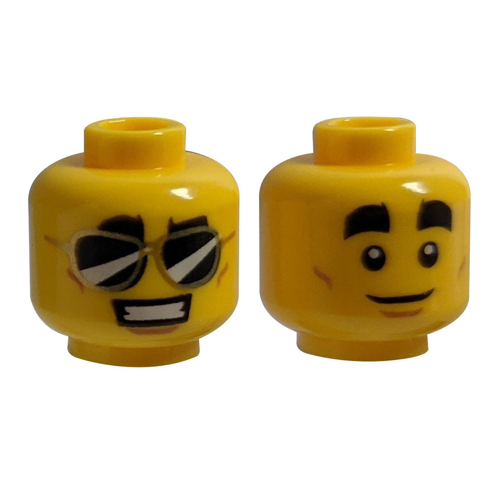 LEGO head 3626cpb2396 with thick eyebrows, sunglasses, and smile.