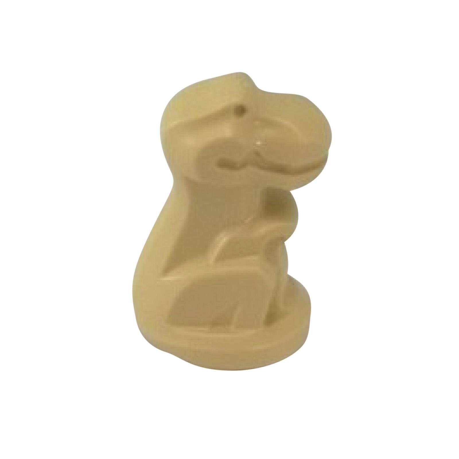Tan dinosaur baby figure in sitting position.
