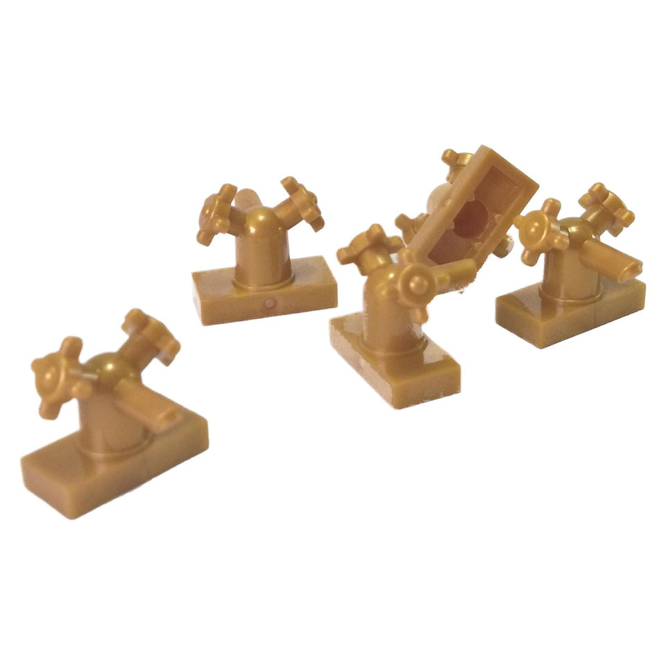 LEGO®  Tap 1 x 2 with Dual Handles (Part 13770) in pearl gold. A small sink faucet piece perfect for minifigure-scale kitchens, bathrooms, and as a greebling detail on custom models.
