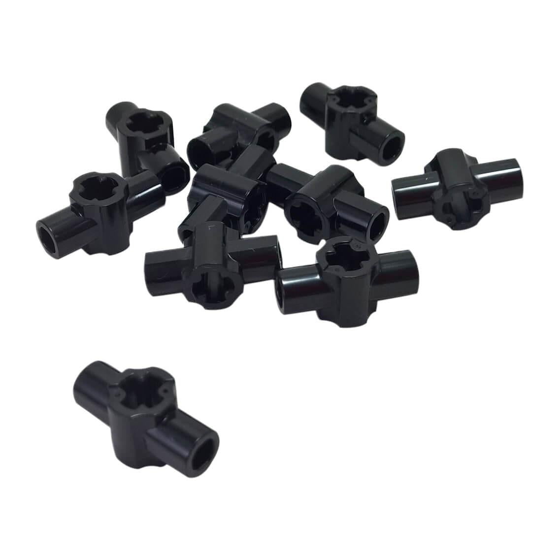Black LEGO® Technic axle hub with two bar holders part 24122 detailed connector element close-up view