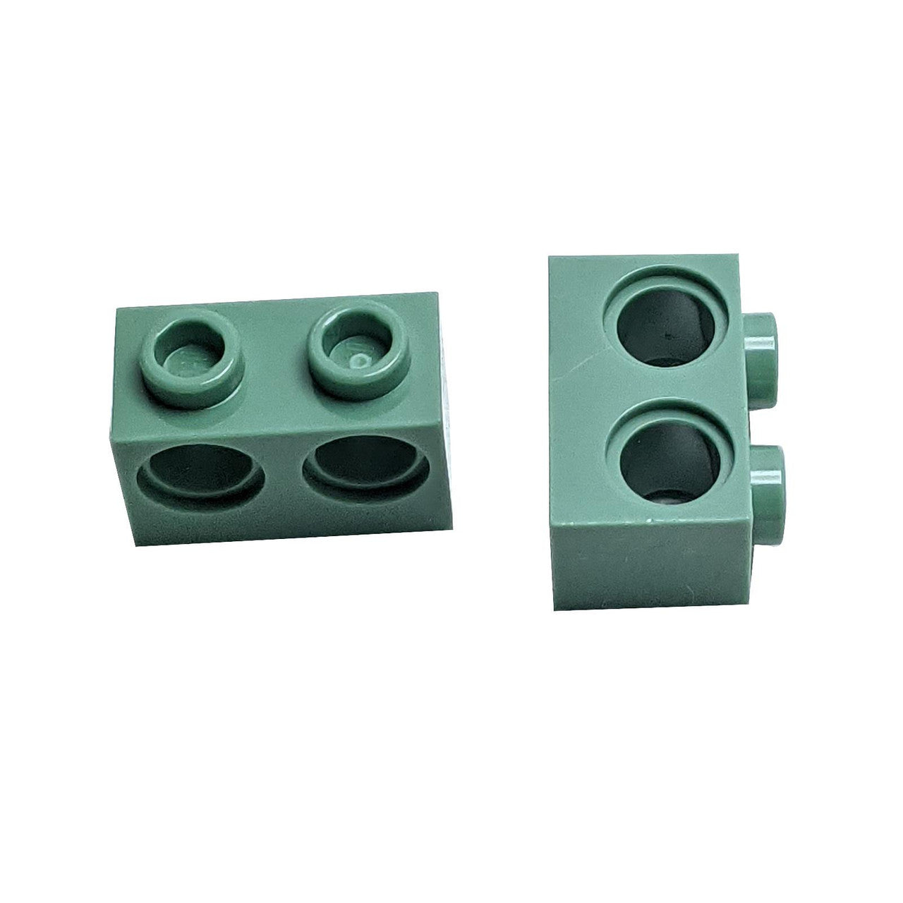 Two sand green Technic Bricks 1 x 2 with Holes 32000.