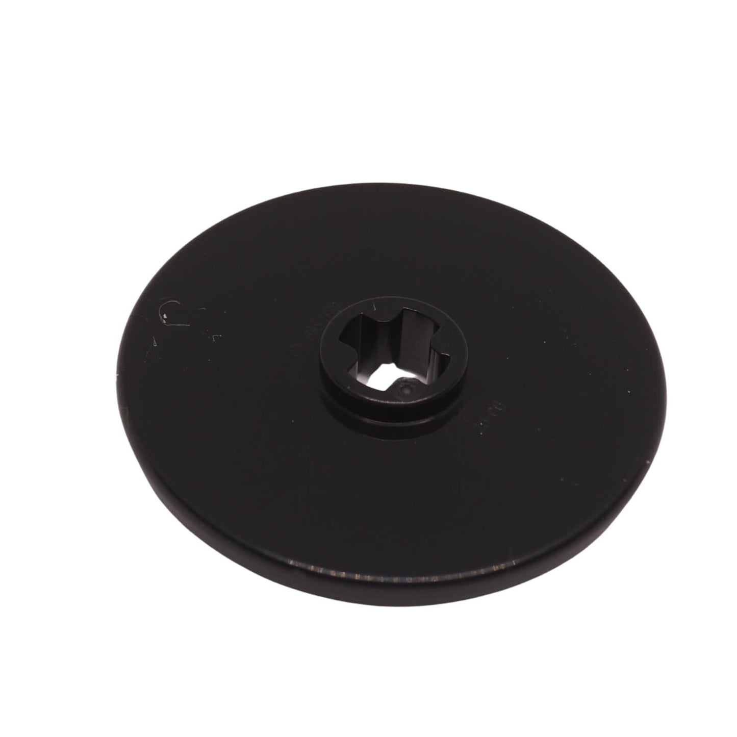 Black LEGO® Technic disk 3x3 part 2723 round plate with center axle hole close-up view