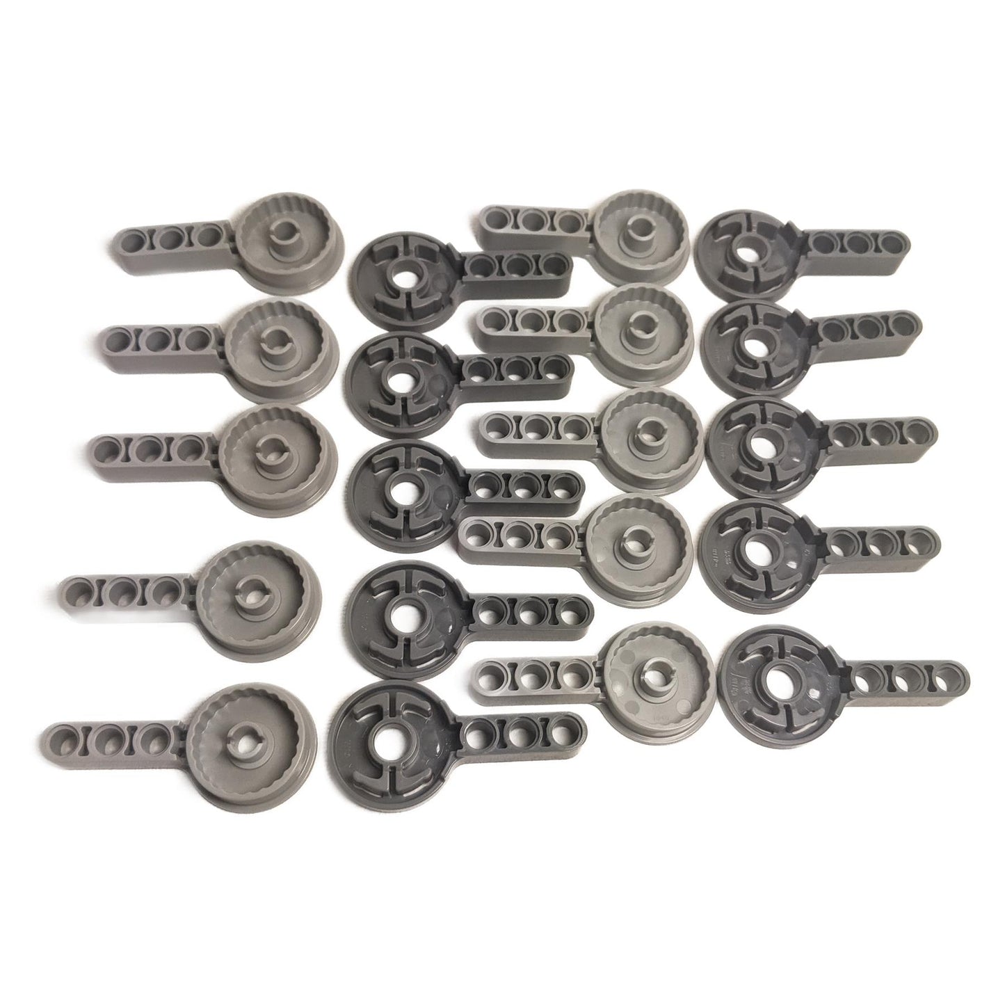 Multiple LEGO® Technic rotation joint disk pieces with pin and 3L liftarm thick connectors used for rotating Technic mechanisms