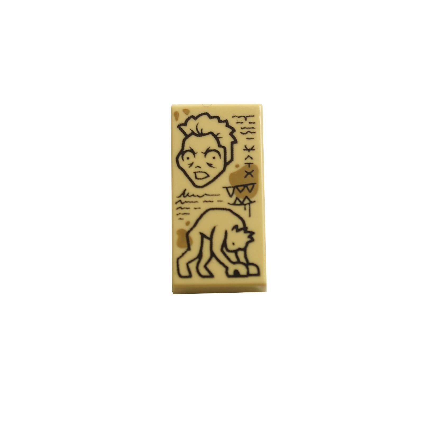 Tan LEGO tile with black scribbles and a monster sketch pattern