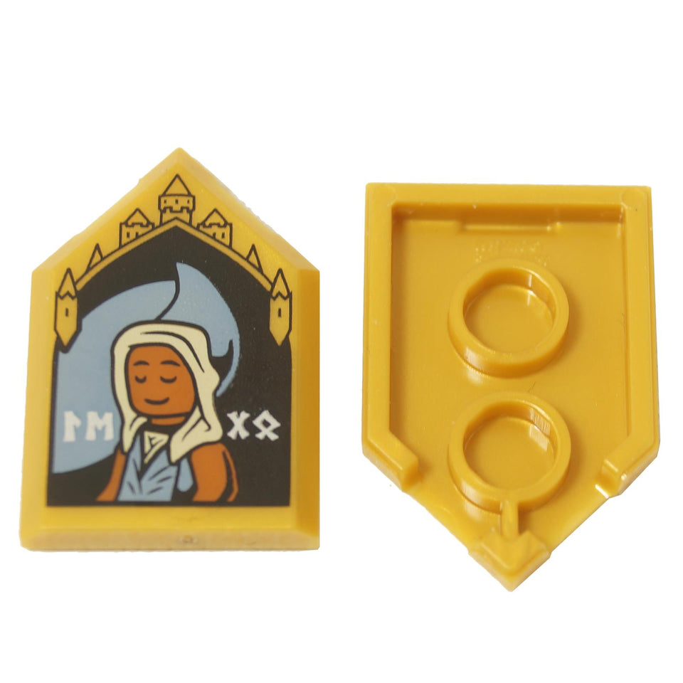 LEGO® Pearl Gold Pentagonal Tile with a printed portrait of the witch Edessa Sakndenberg. Front and back view.