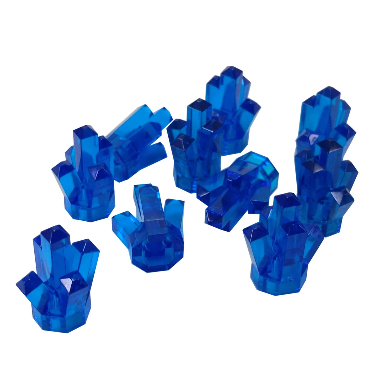 Multiple LEGO® trans-dark blue Rock 1 × 1 Crystal 5 Point elements shown from various angles
