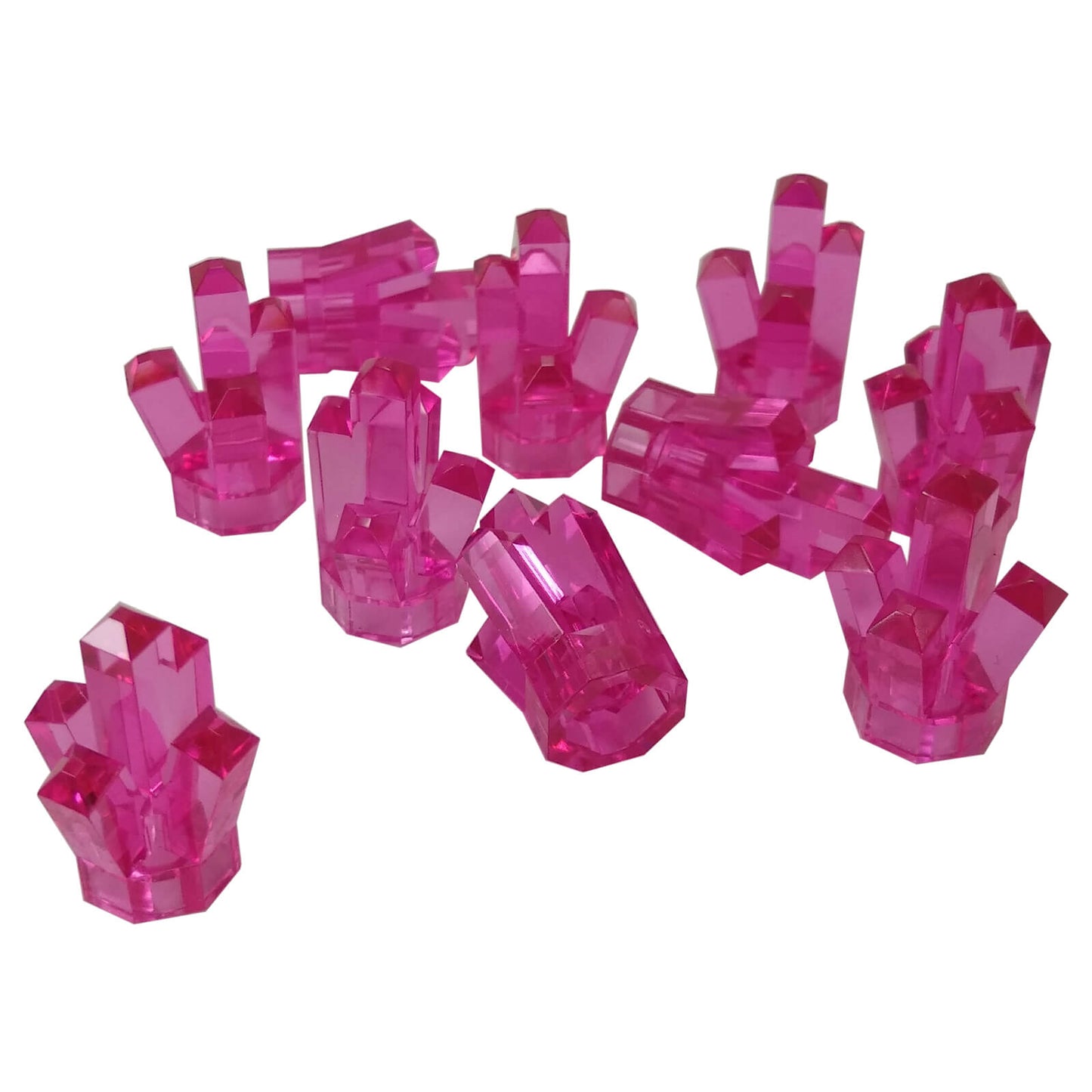 Multiple LEGO® trans-dark pink Rock 1 × 1 Crystal 5 Point elements shown from various angles