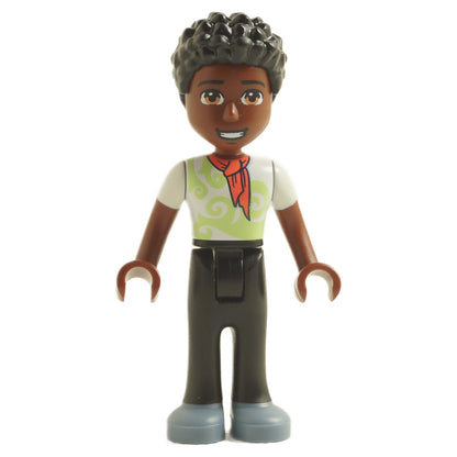 LEGO mini-doll figure named Trevor with a white shirt, green vest, red scarf, and black pants.