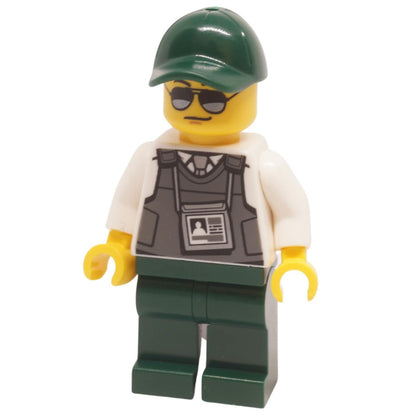 LEGO trn243 Security Officer minifigure with sunglasses, dark green cap, and tactical body armor vest.